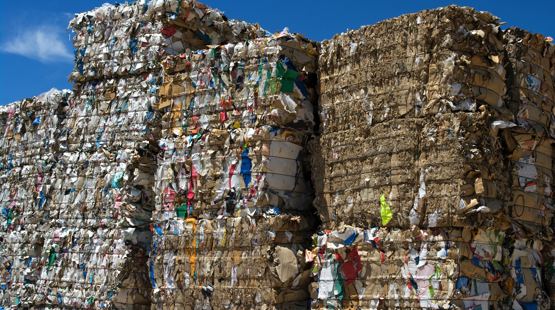 Bales of cardboard and paper ready to be recycled.