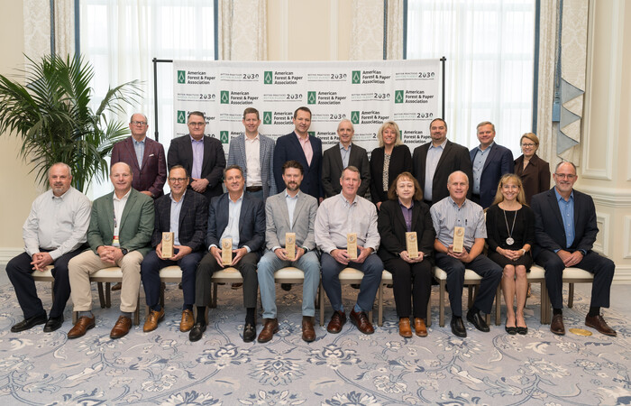 Group photo in front of AF&PA banner, holding Sustainability Awards.