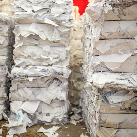 Mixed white office paper recycling bales